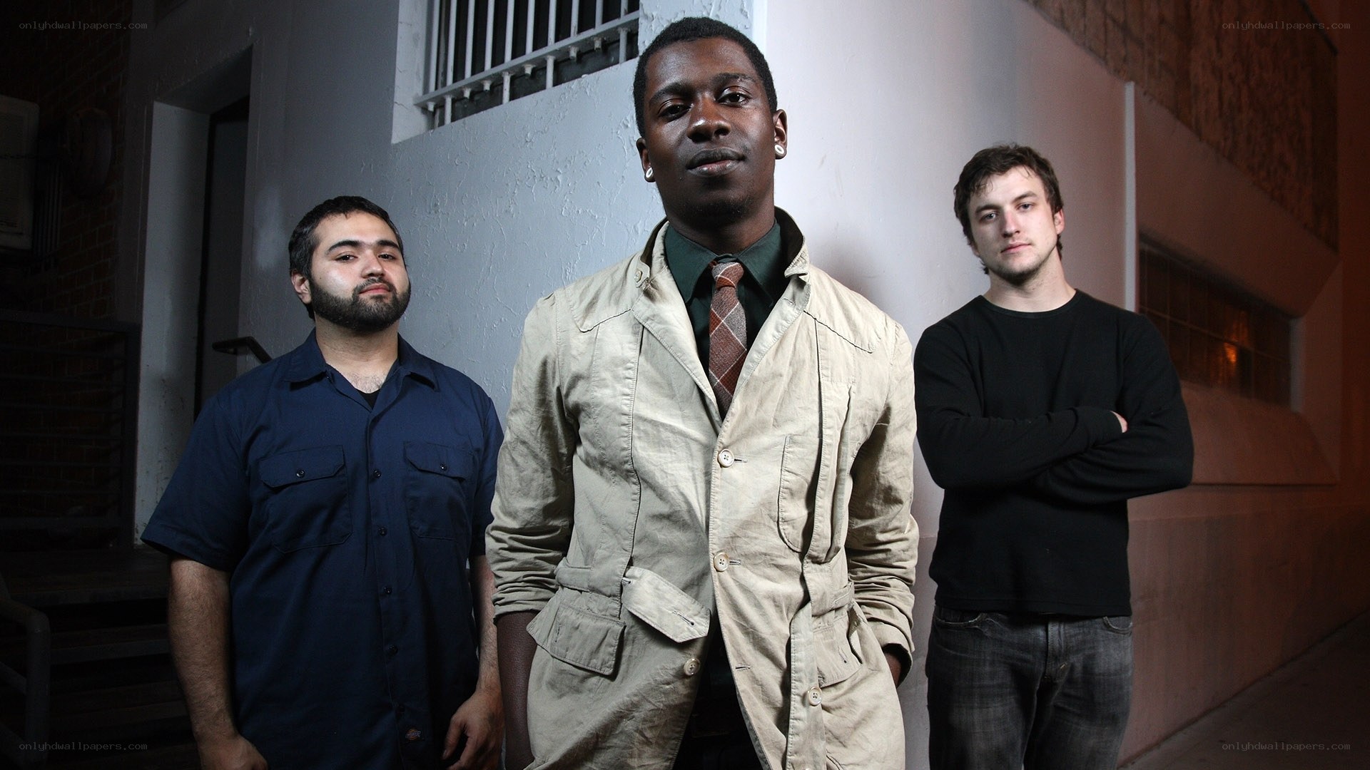 three men standing together