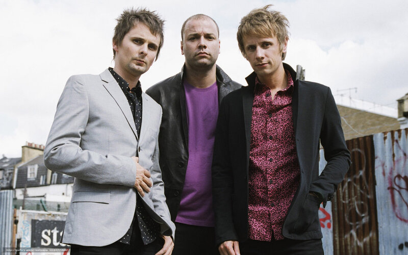 Three Men Standing Together — Gray, Serious