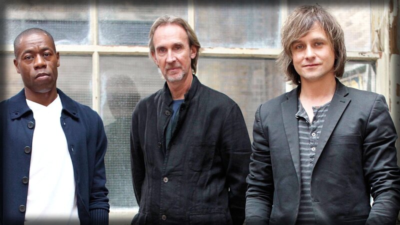 three men standing together