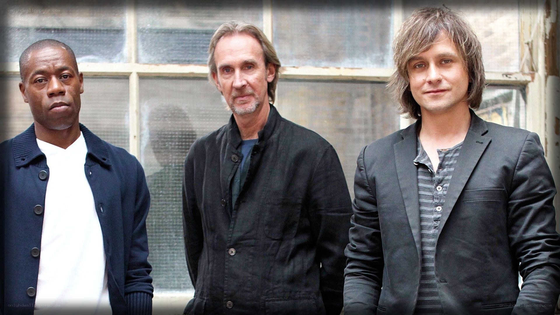 three men standing together
