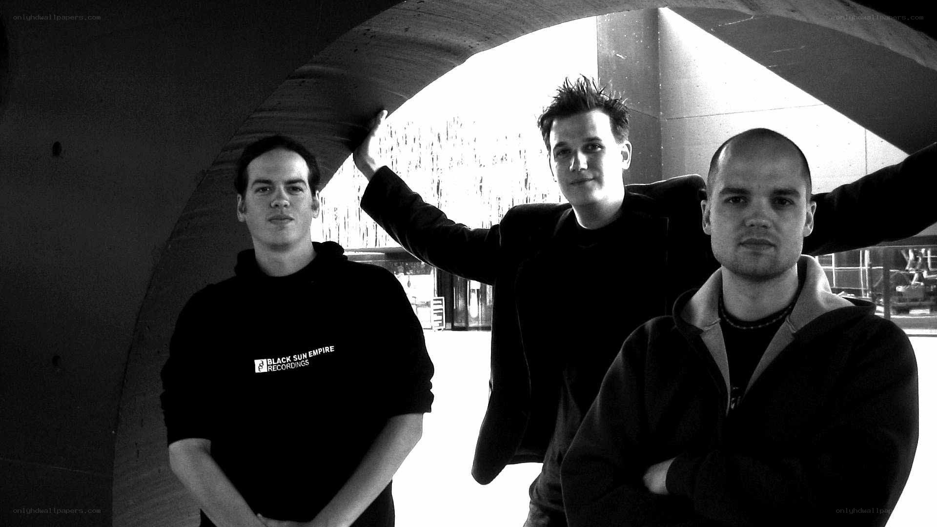 three men under an archway