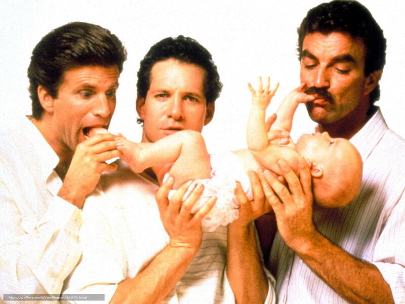 Three men with a baby