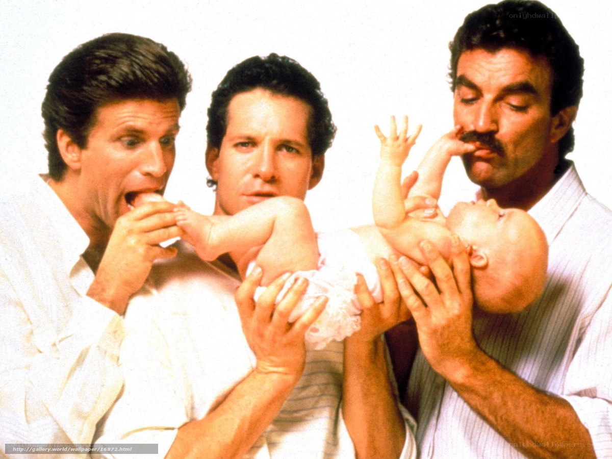 Three men with a baby