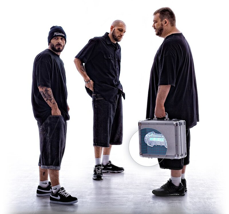 Three men with a briefcase