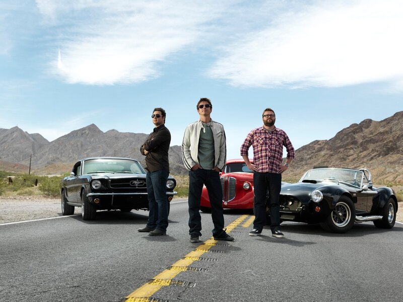 Three Men with Classic Cars