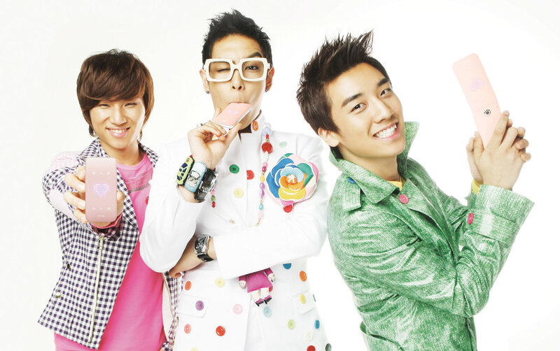 Three men with colorful phones