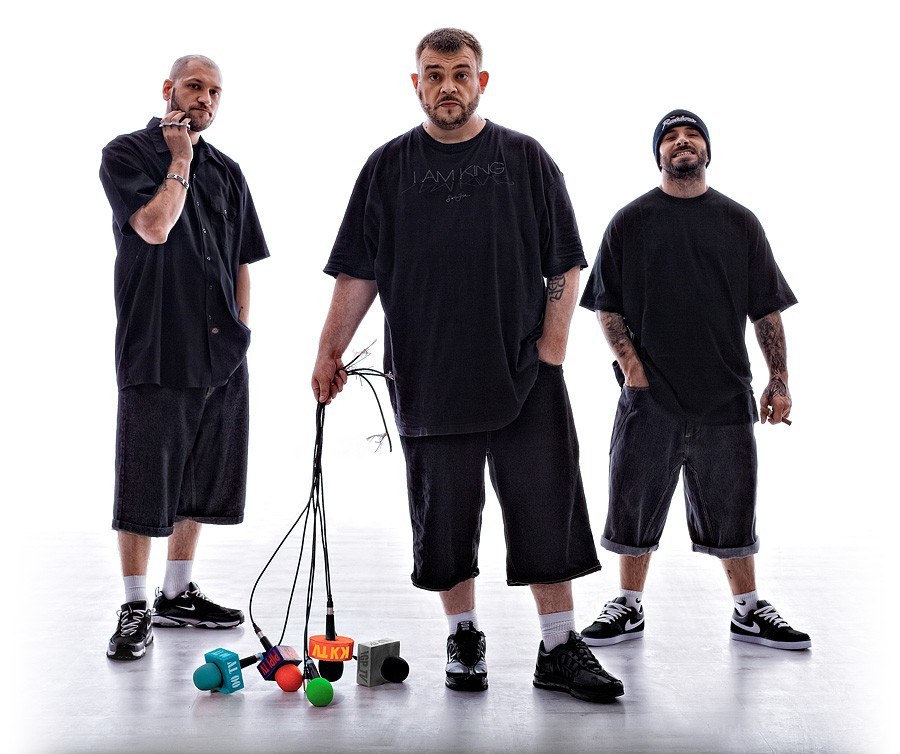 three men with microphones