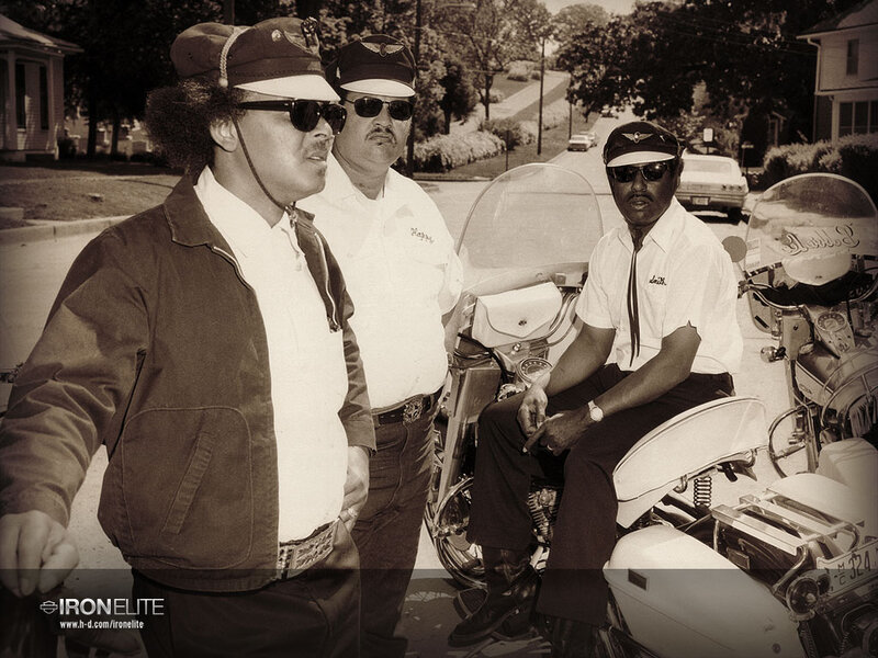 Three Men with Motorcycles