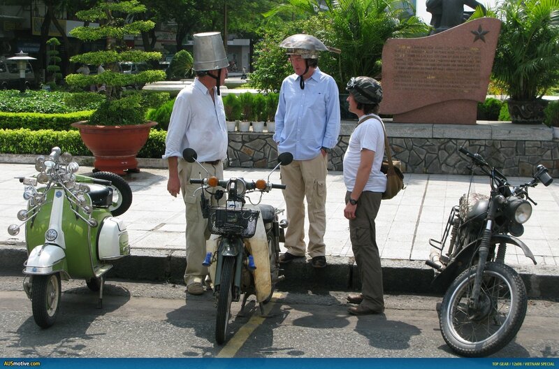 Three Men with Scooters
