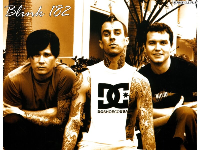Three Men with Tattoos — Brown