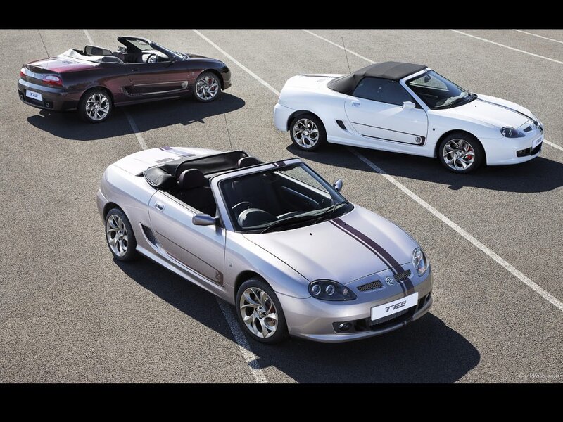 Three MG TF sports cars