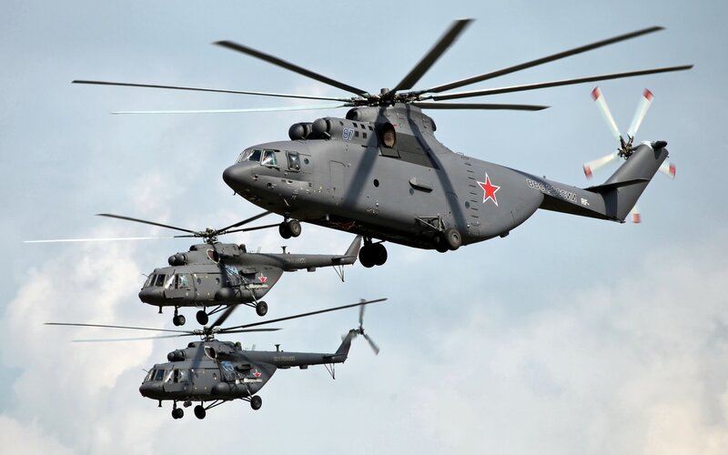 Three Military Helicopters