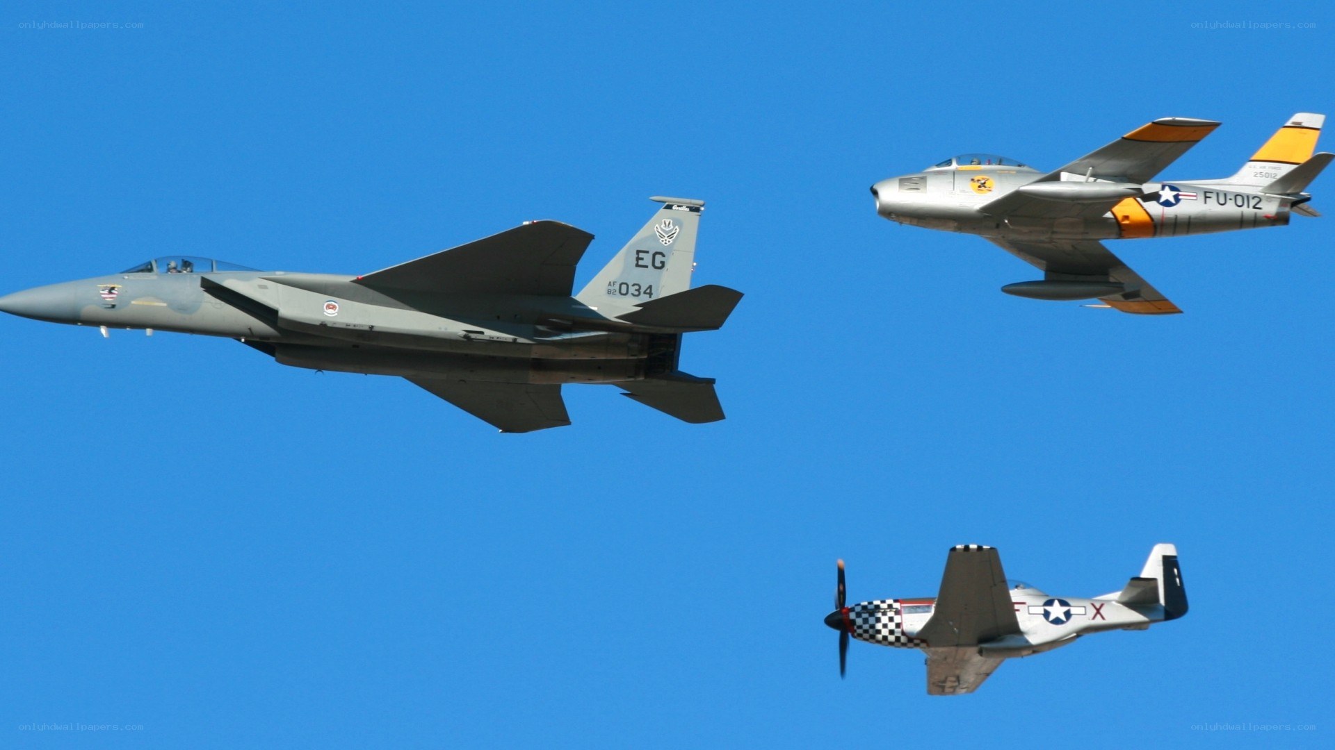 Three military jets in formation