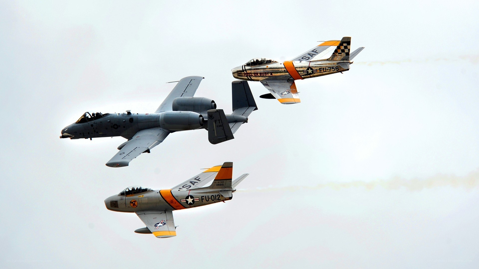 Three military jets in formation