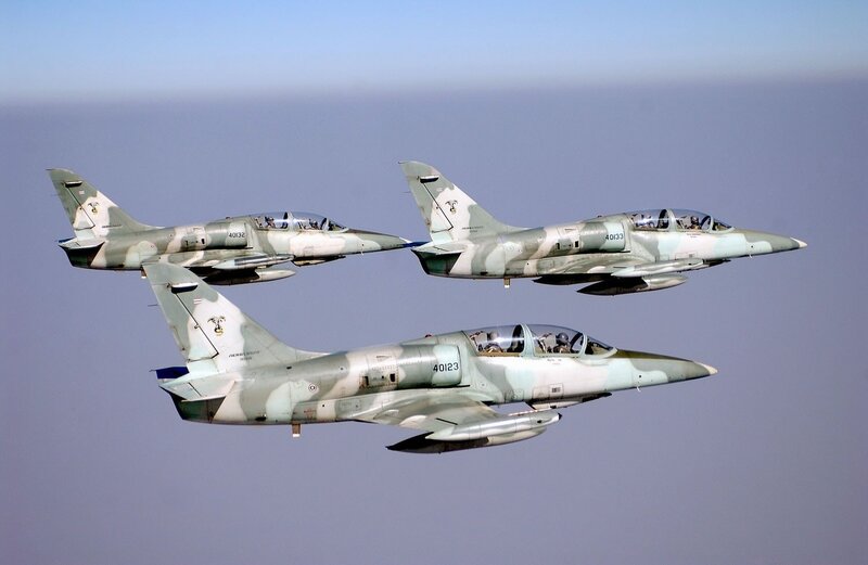 Three Military Jets in Formation — Gray, Calm