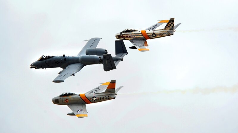 Three Military Jets in Formation — Gray, Dynamic, Photograph