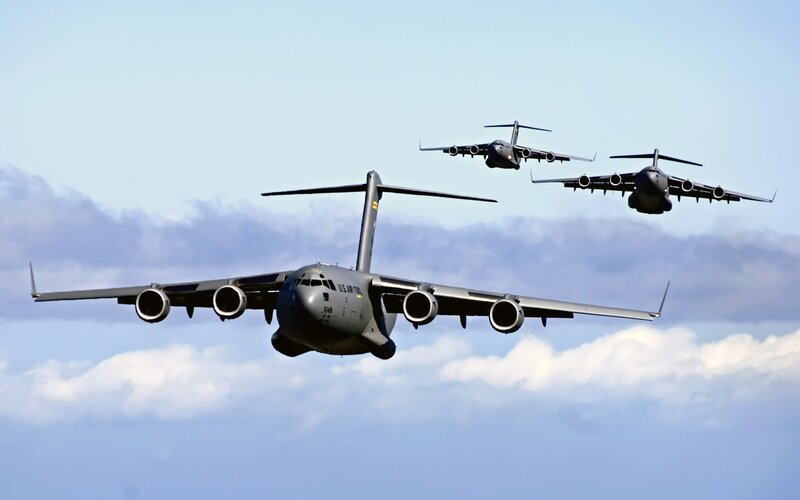 Three Military Transport Planes — Gray, Dramatic