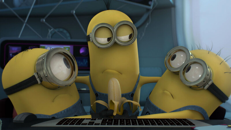 Three Minions at Computer
