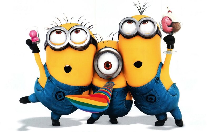 Three Minions Holding Treats