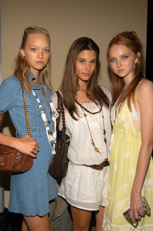 Three models at fashion event