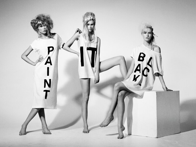 Three models in graphic t-shirts