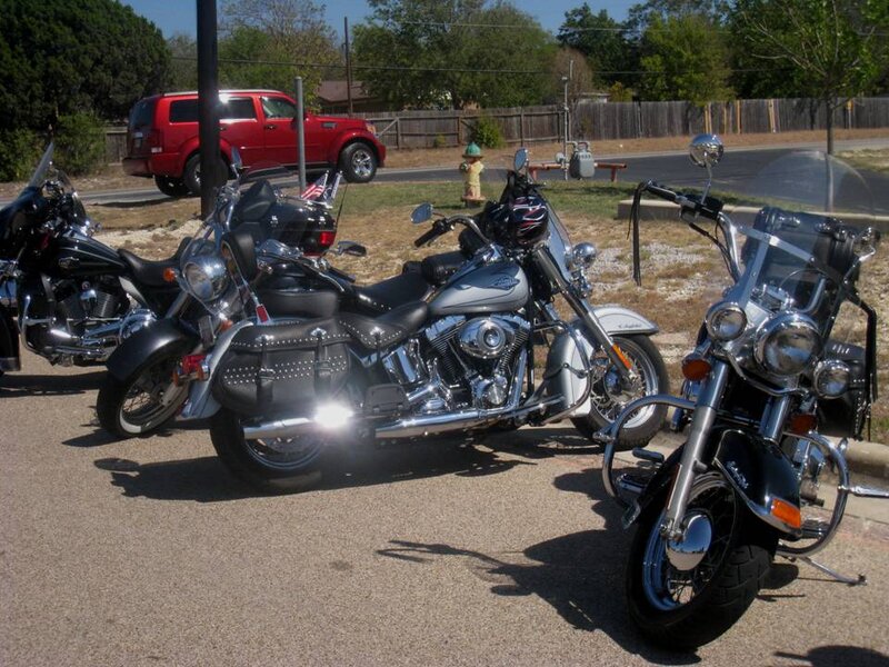 Three Motorcycles Parked — Black