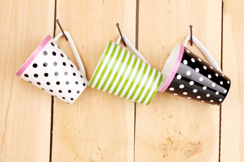 Three Mugs on Hooks