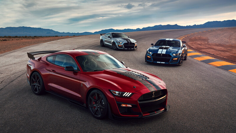 Three Muscle Cars on Track — Red