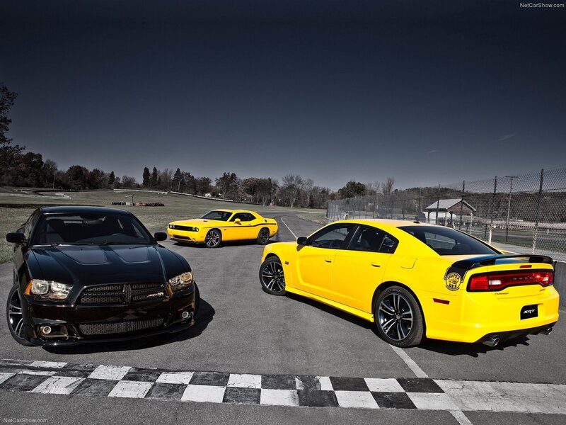 Three Muscle Cars on Track — Yellow