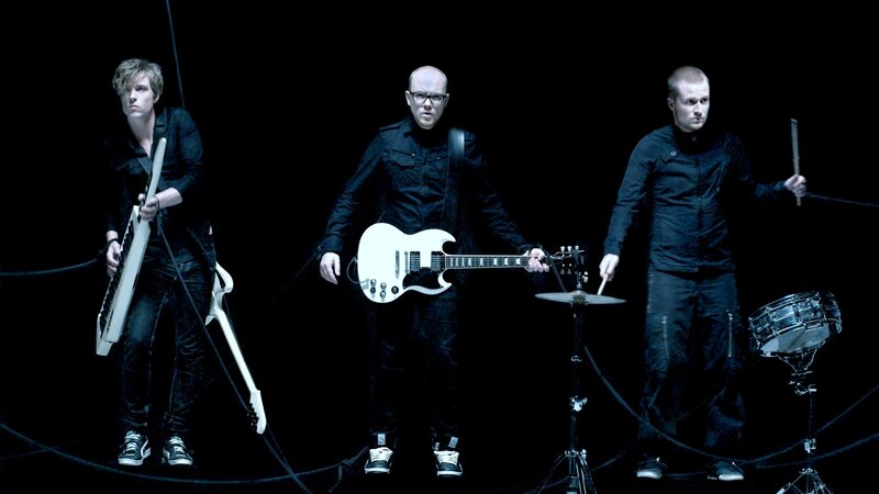 Three Musicians on Stage — Black, Dramatic, Photograph