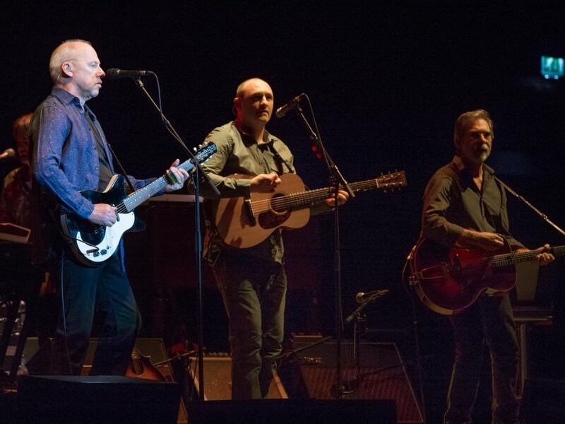 Three Musicians on Stage — Black, Performing
