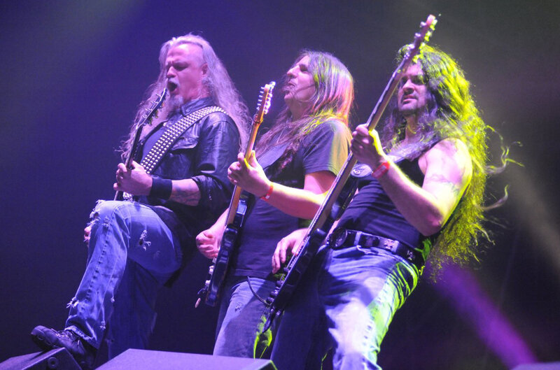 Three Musicians on Stage — Purple