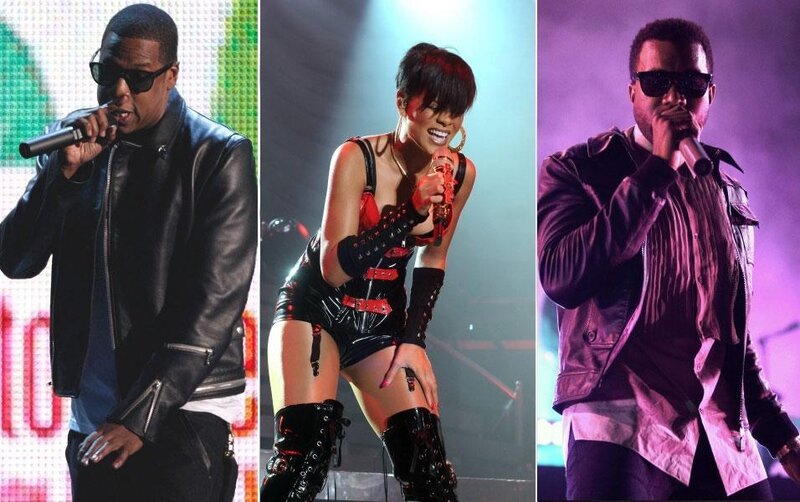 three musicians performing on stage