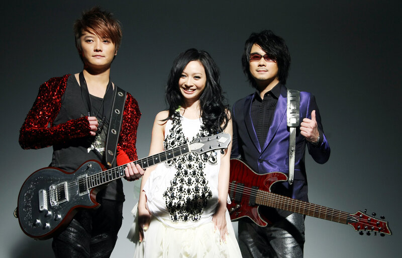 Three Musicians with Guitars