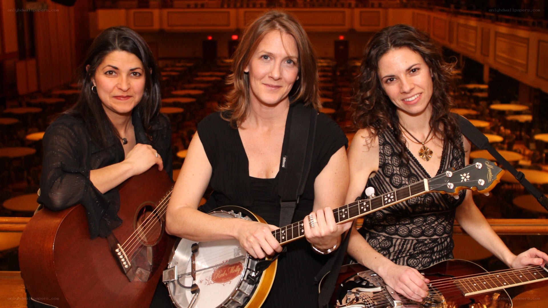 three musicians with instruments