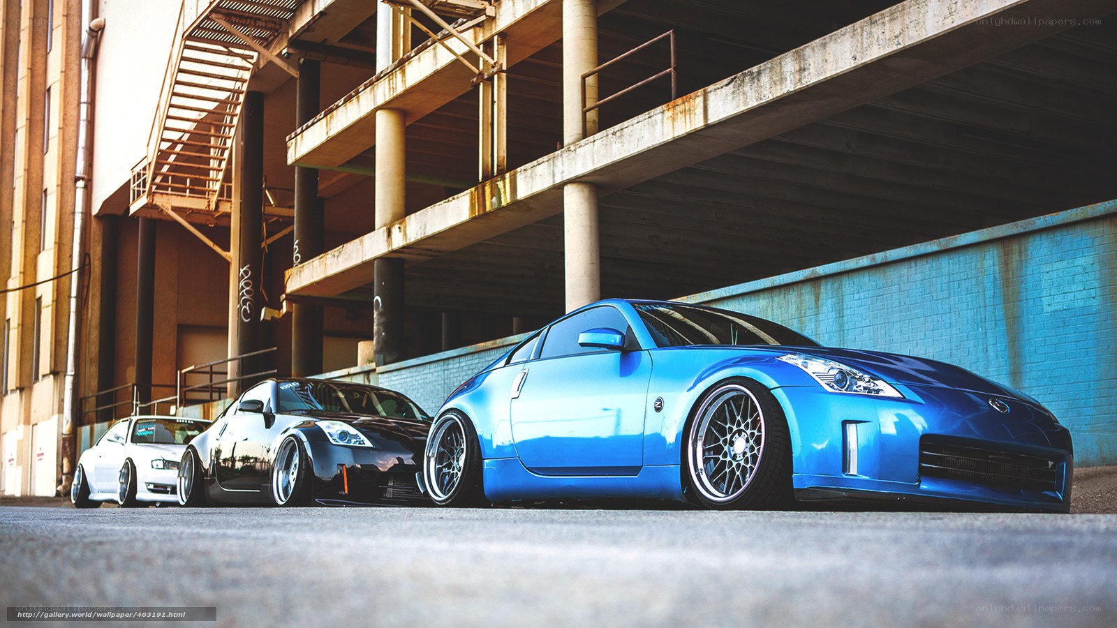 Three Nissan Z Cars in Urban Setting
