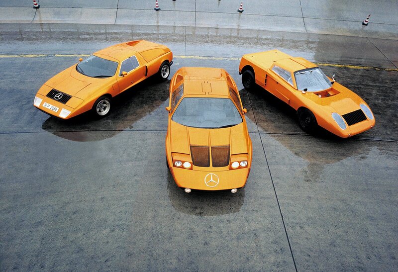 Three orange Mercedes-Benz concept cars