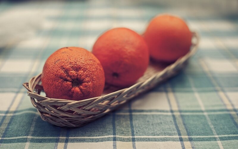 Three Oranges in Basket