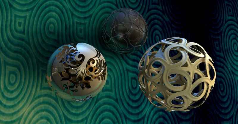 Three ornate spheres on patterned background