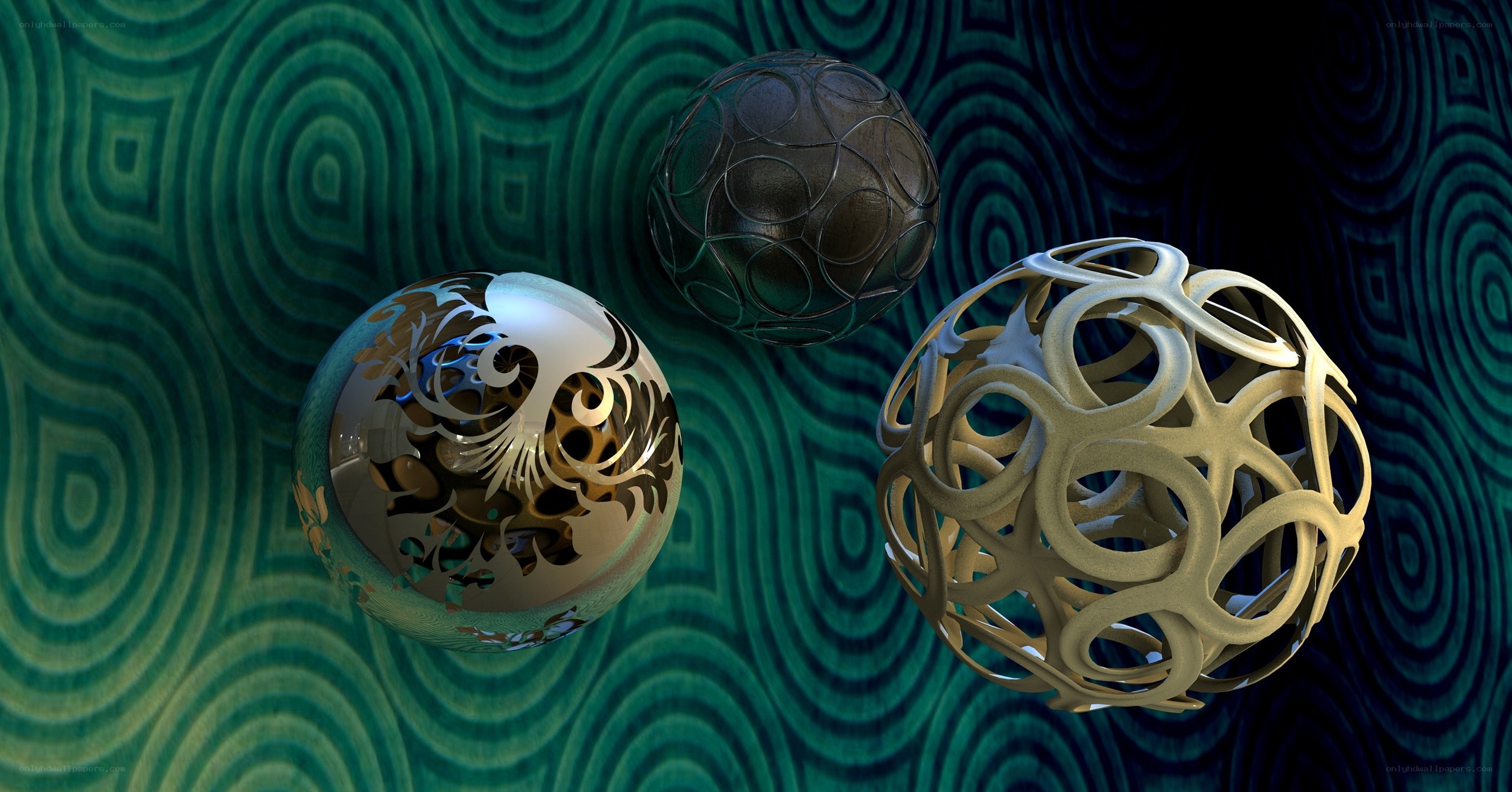 Three ornate spheres on patterned background