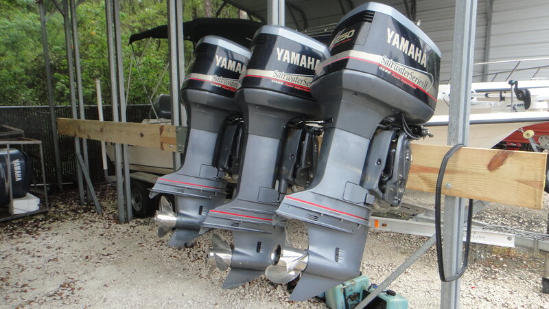 Three Outboard Motors