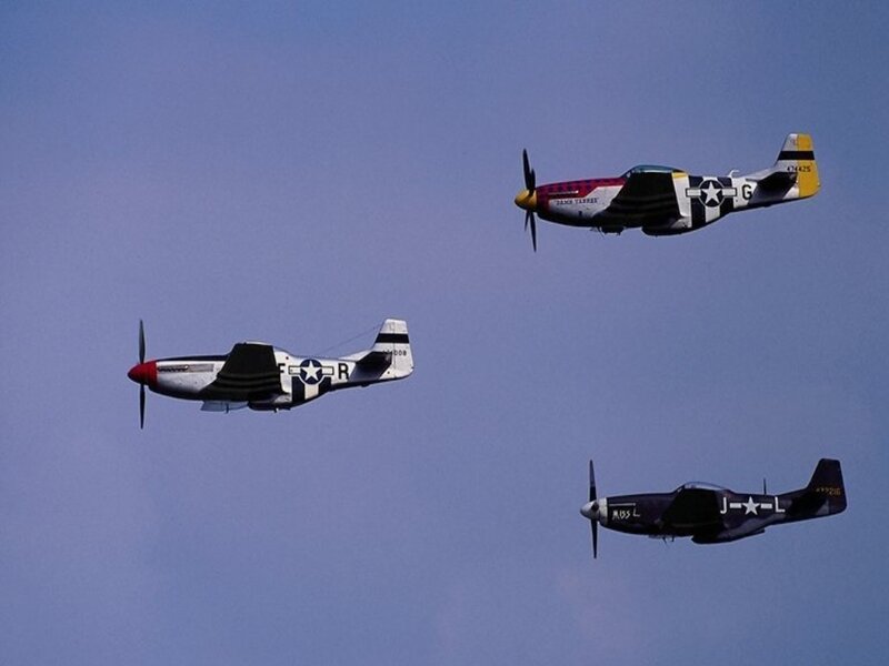 Three P-51 Mustangs in formation