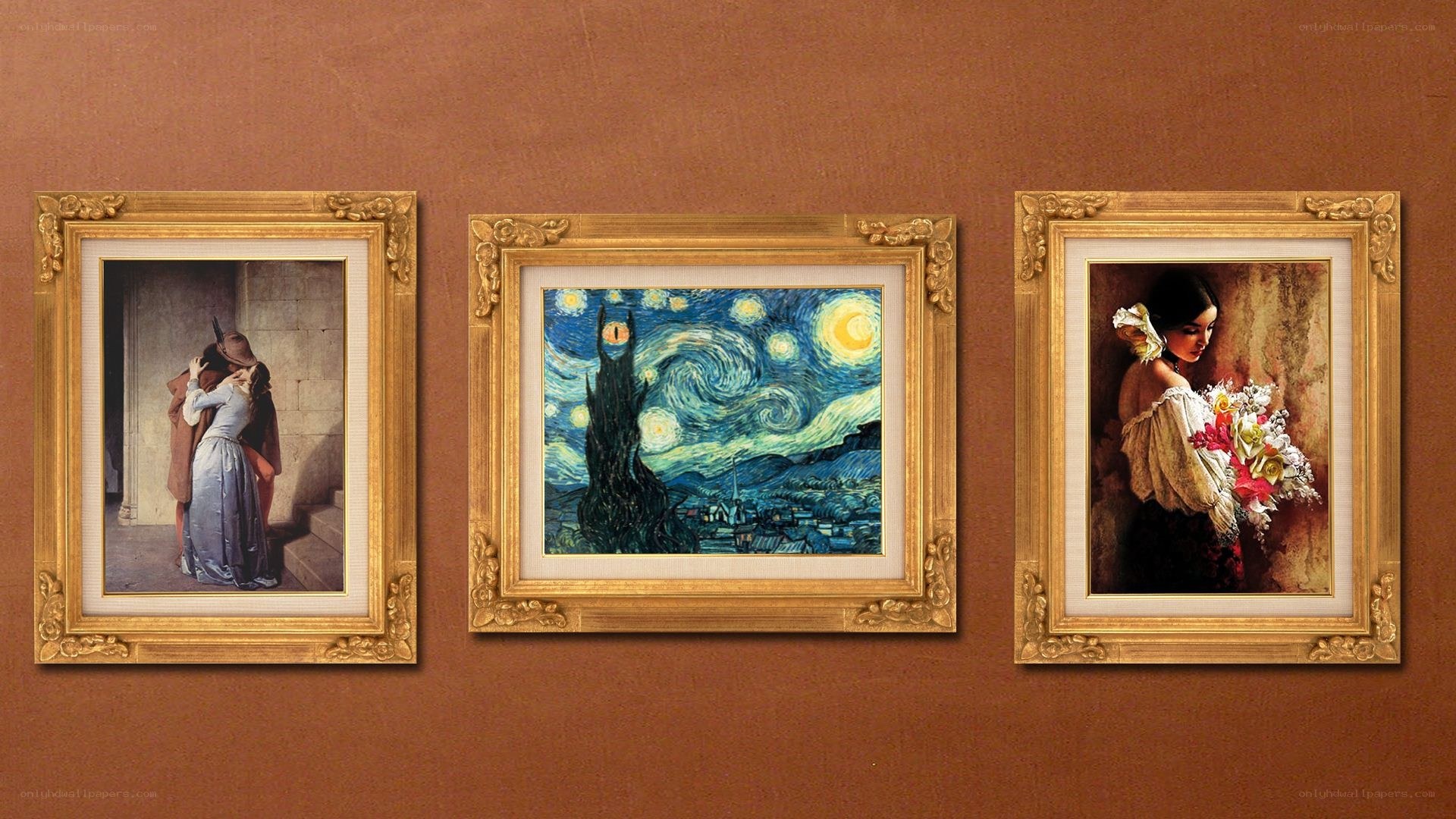 Three paintings on a wall