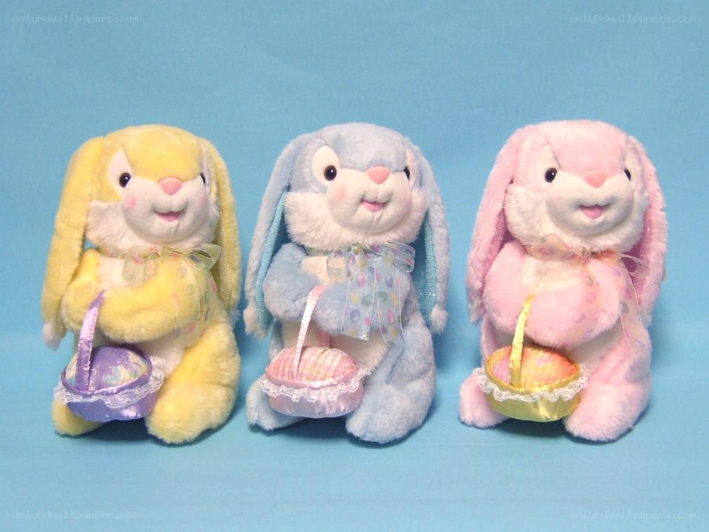Three pastel Easter bunnies