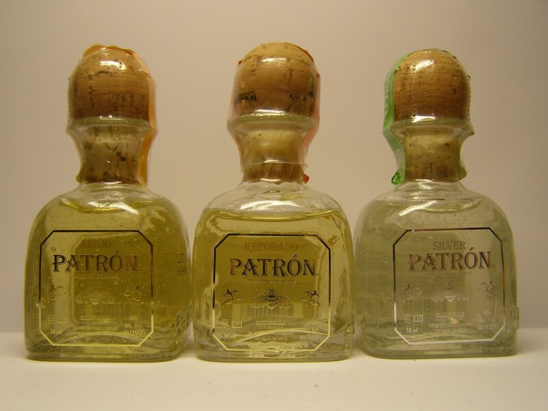 Three Patron tequila bottles