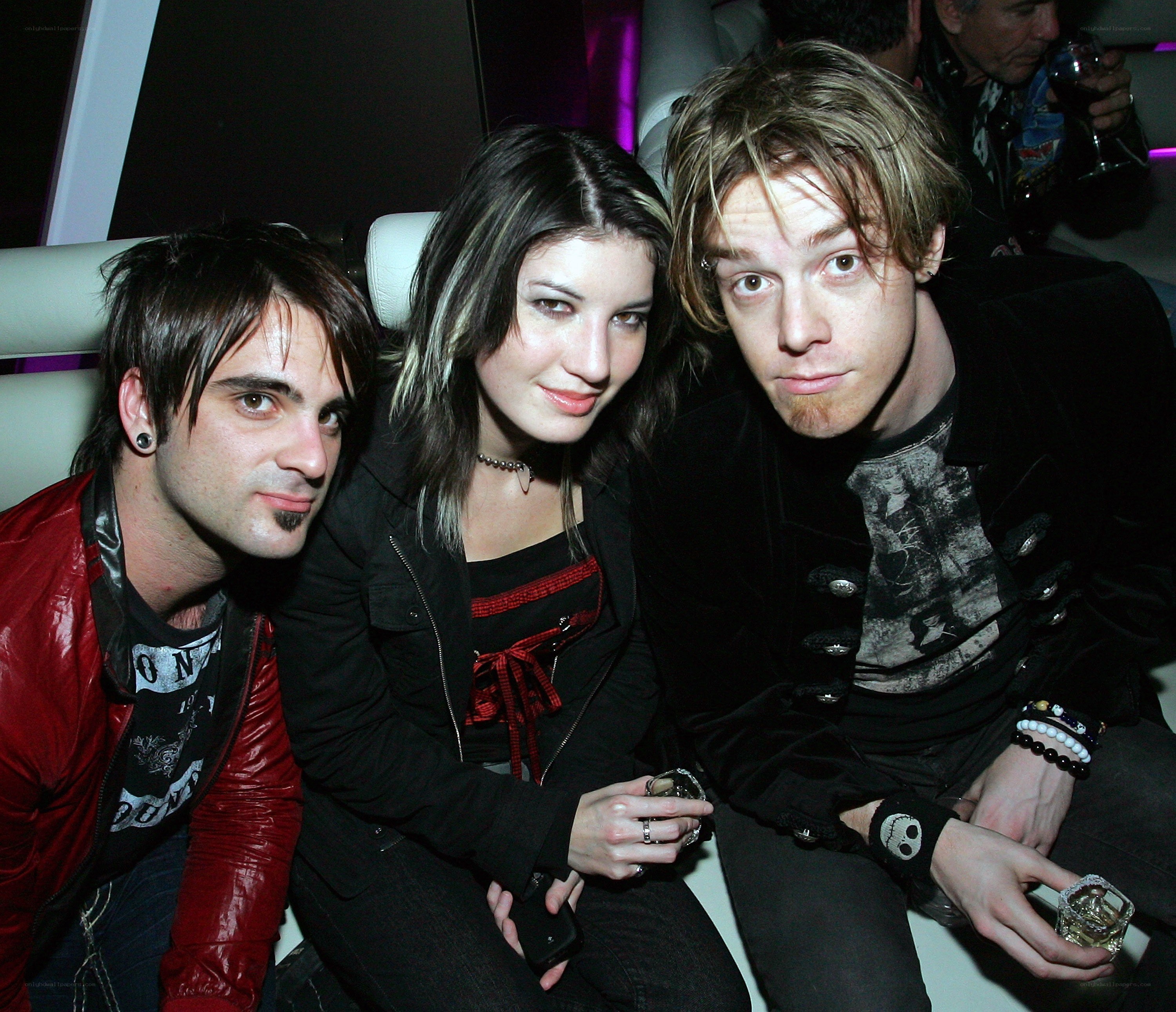 three people at a party