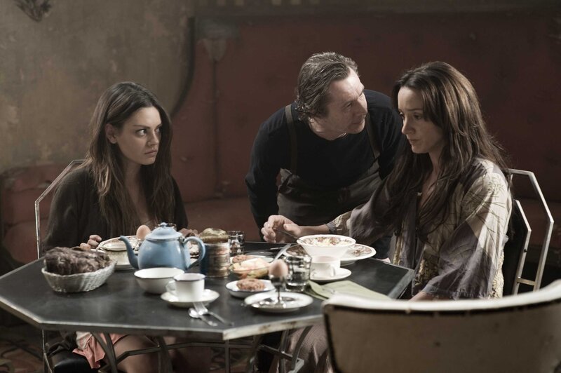 Three People at a Table — Brown, Dramatic
