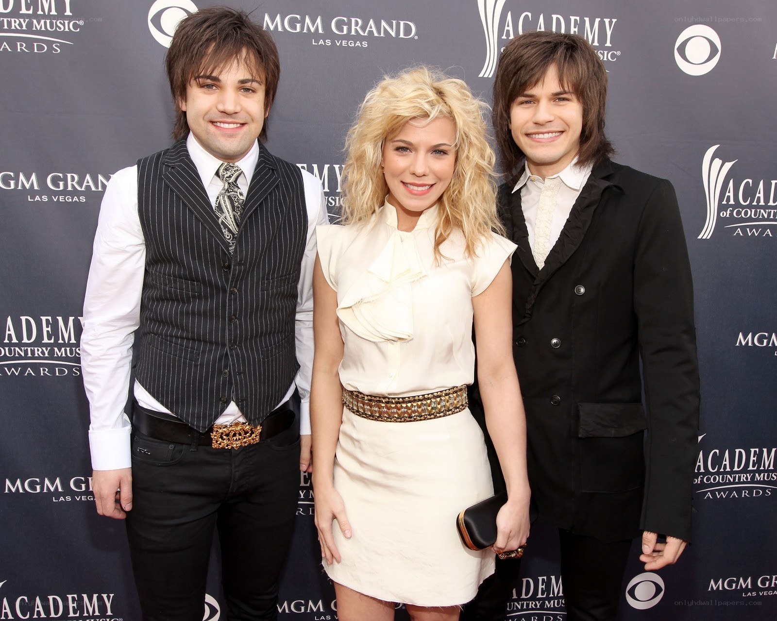 three people at awards event