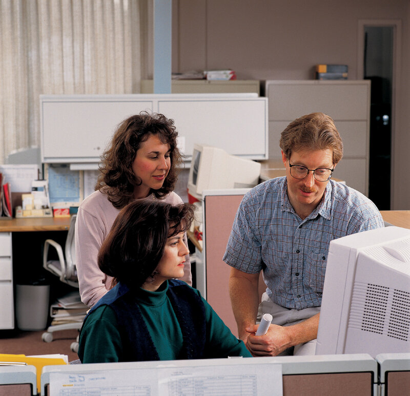 Three People at Computer