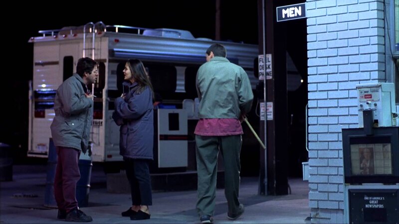 Three People at Gas Station
